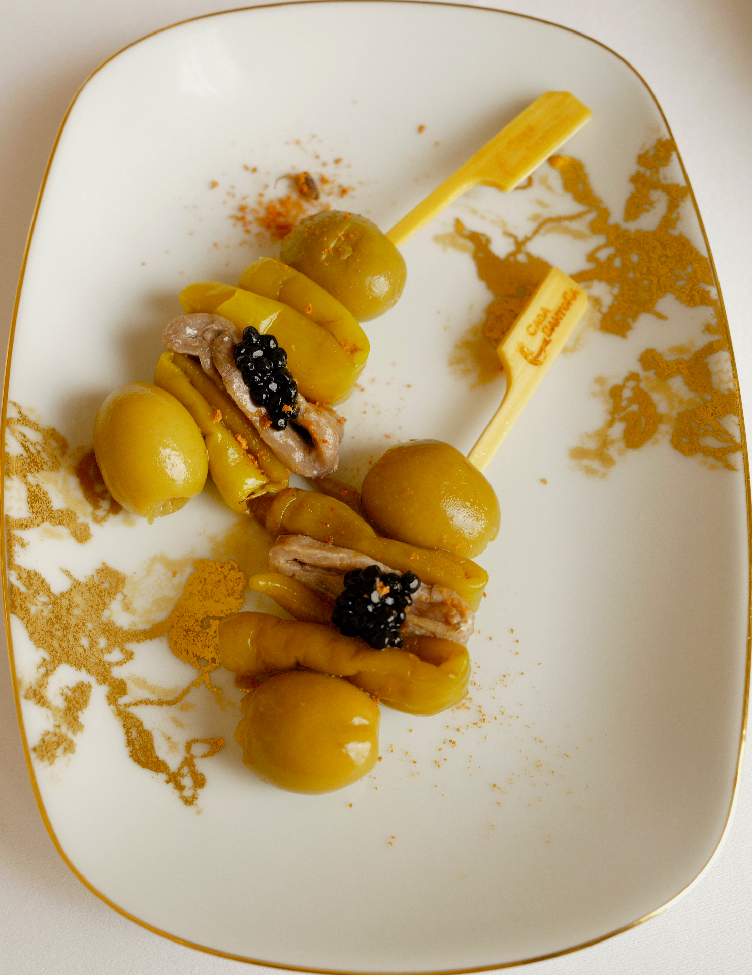 Gilda-style pintxos with anchovy, guindilla pepper, olive, and a touch of caviar — at the restaurant inside Hotel María Cristina, San Sebastián.
